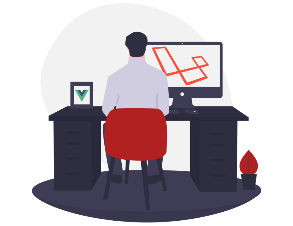 man sitting at desk working on computer