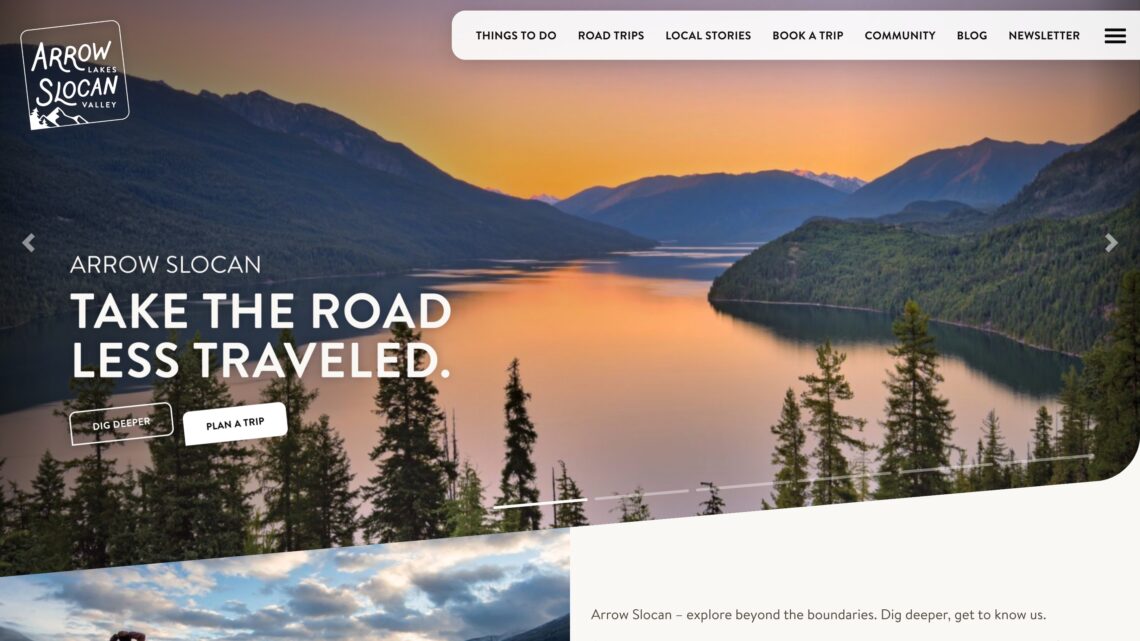 A screenshot of the Arrow Slocan website homepage with a beautiful photo of a BC lake and forest at sunset, built by the Kelowna web design and Kelowna Marketing Agency called Navigator Multimedia.