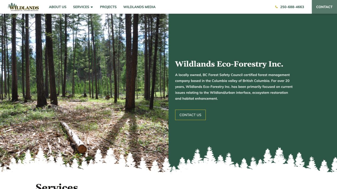 A screenshot of the Wildlands Eco-Forestry Inc. website homepage with a beautiful a natural forest on sunny day, built by the Kelowna web design and Kelowna Marketing Agency called Navigator Multimedia.